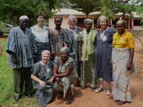 teaching group in traditional smocks